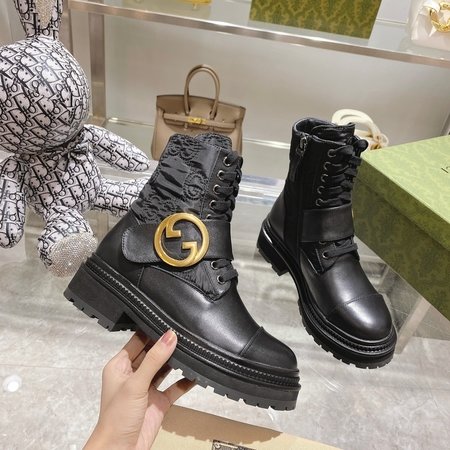 Gucci Embroidered patchwork cowhide boots