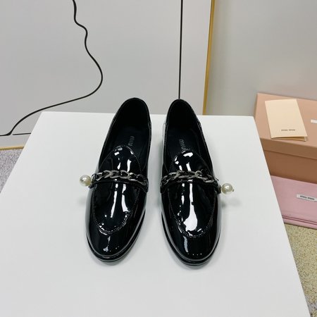 Miu Miu patent leather loafers