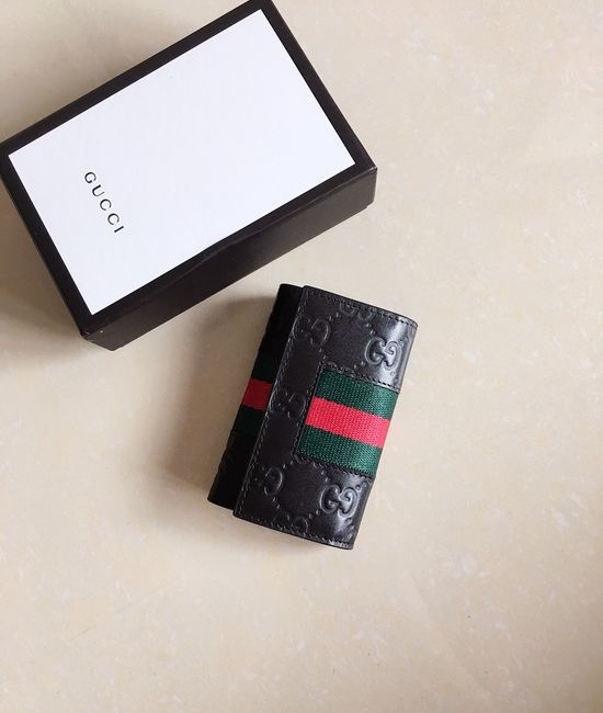 Gucci Key Holder Embossed Leather Signature Web Stripe 408828