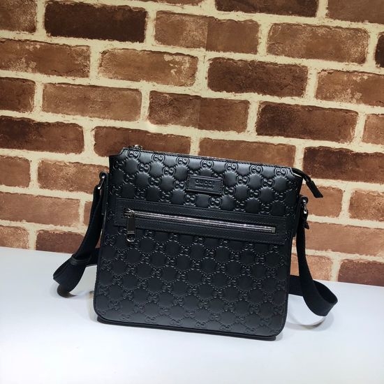 Gucci Embossed Leather Clutch 406410