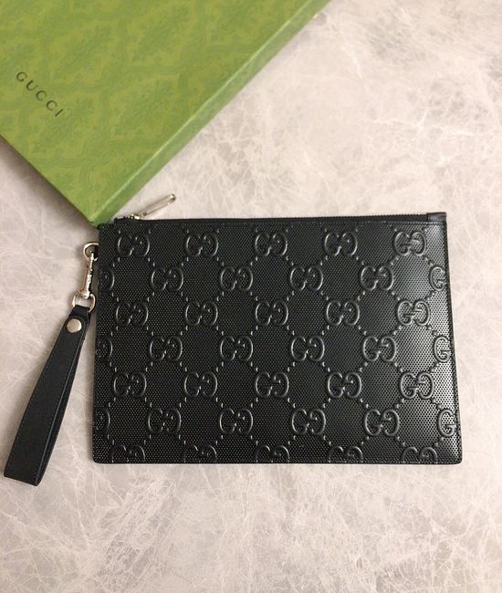 Gucci GG Embossed Leather Clutch Bag 625569