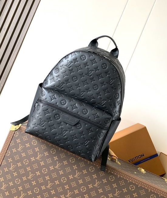 Louis Vuitton LV Discovery Monogram Leather Backpack with Metal Details M46553