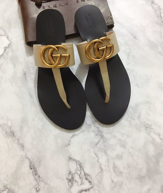 Gucci Cowhide Upper Flip Flops with Metal Decor