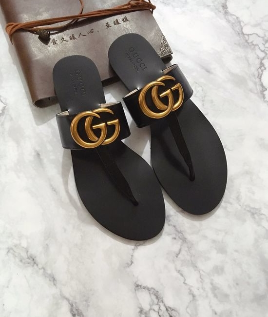 Gucci Cowhide Upper Flip Flops with Metal Decor