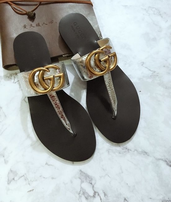 Gucci Cowhide Upper Flip Flops with Metal Decor