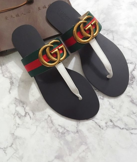 Gucci Cowhide Upper Flip Flops with Metal Decor