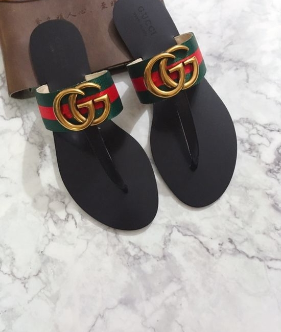 Gucci Cowhide Upper Flip Flops with Metal Decor