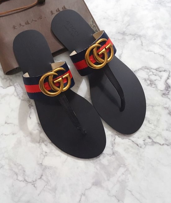 Gucci Cowhide Upper Flip Flops with Metal Decor