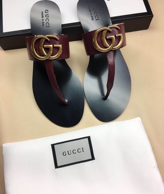 Gucci Cowhide Upper Flip Flops with Metal Decor