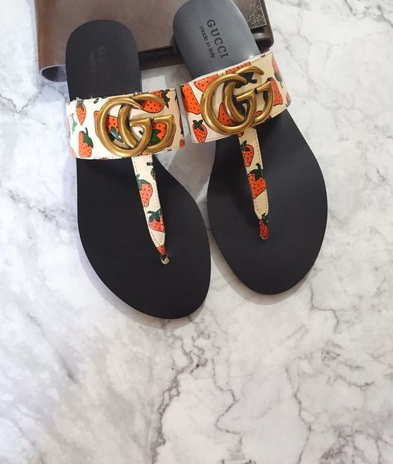 Gucci Cowhide Upper Flip Flops with Metal Decor