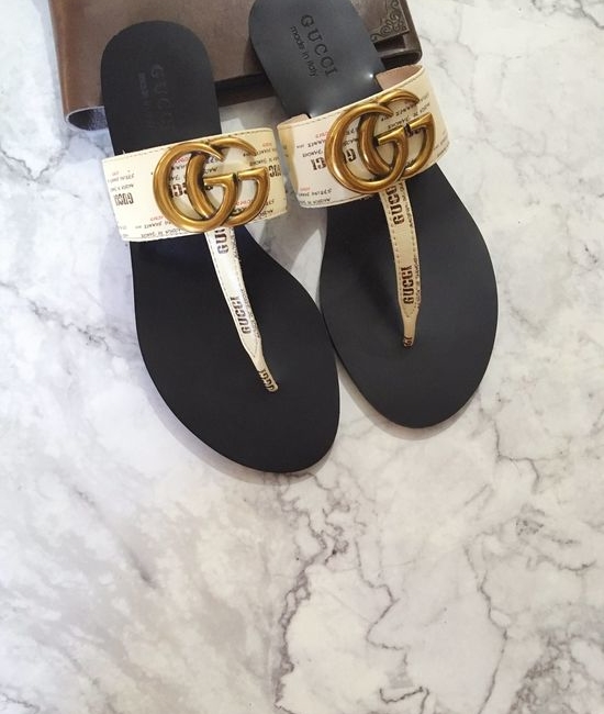 Gucci Cowhide Upper Flip Flops with Metal Decor
