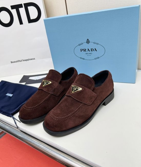 Prada Soft Leather Round Toe Loafers with Logo Buckle