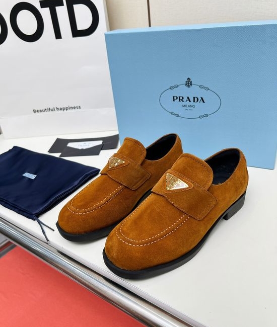 Prada Soft Leather Round Toe Loafers with Logo Buckle