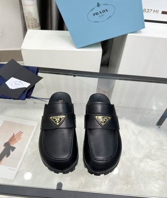 Prada Elegant Leather Casual Shoes with Embossed Logo Detail