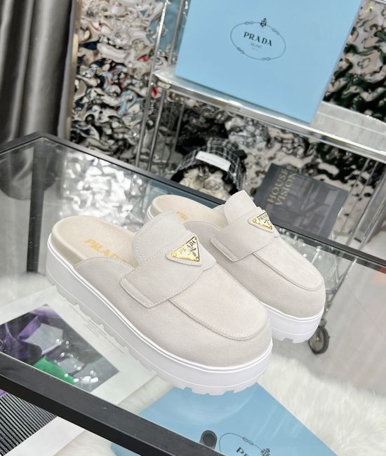 Prada Suede Closed Toe Slides with Geometric Heel