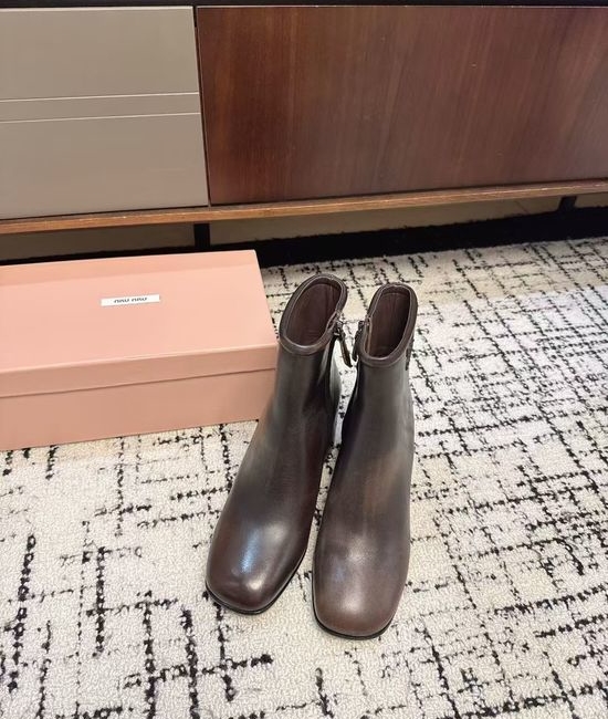 Miu Miu Classic Military-Style Ankle Boots with Smooth Leather