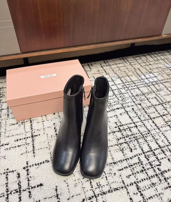 Miu Miu Classic Military-Style Ankle Boots with Smooth Leather