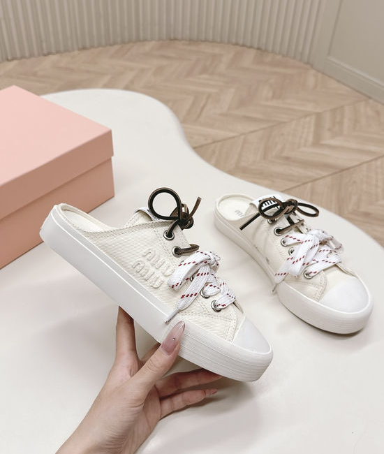 Miu Miu Casual Canvas Sneakers with Double Lace Design