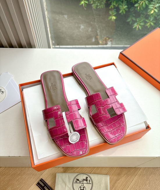 Hermes Flat Slide Sandals with Metal Lock Buckle and Leather Upper