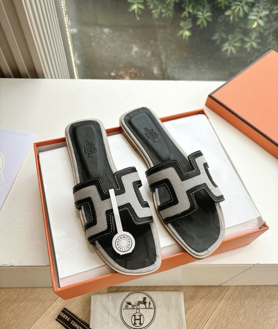 Hermes Flat Slide Sandals with Metal Lock Buckle and Leather Upper
