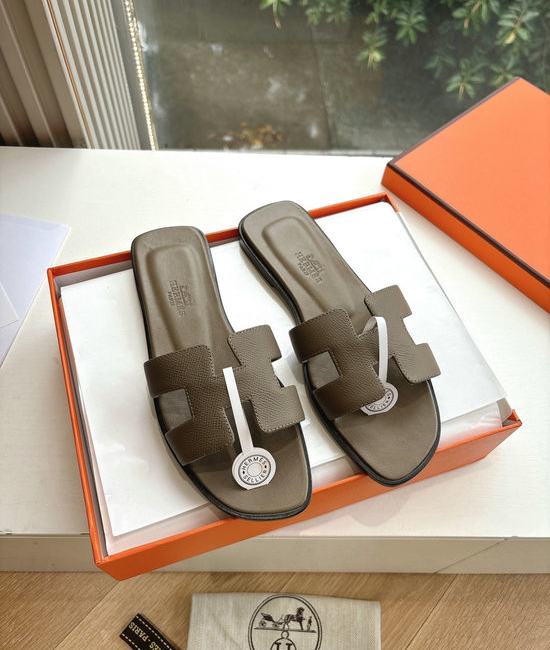Hermes Flat Slide Sandals with Metal Lock Buckle and Leather Upper