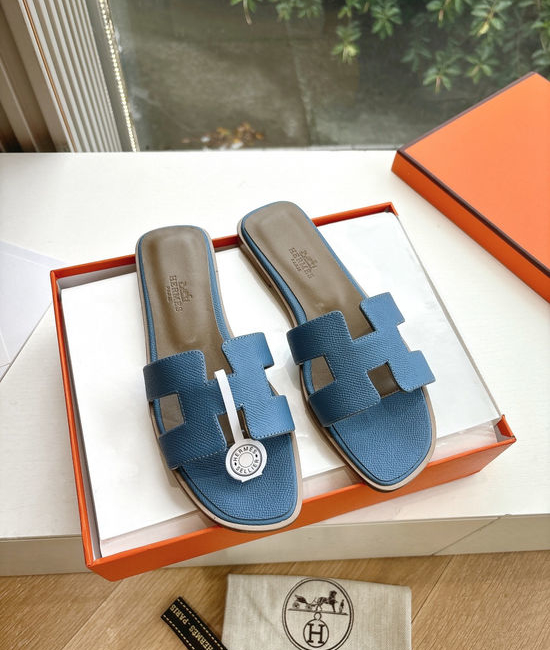 Hermes Flat Slide Sandals with Metal Lock Buckle and Leather Upper