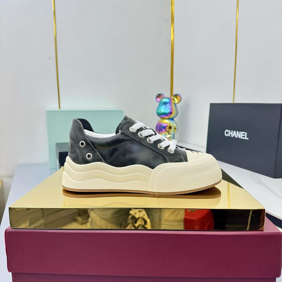 Chanel Classic Black and White Casual Board Shoes with Breathable Design