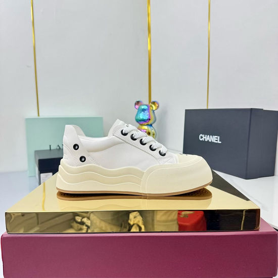 Chanel Classic Black and White Casual Board Shoes with Breathable Design