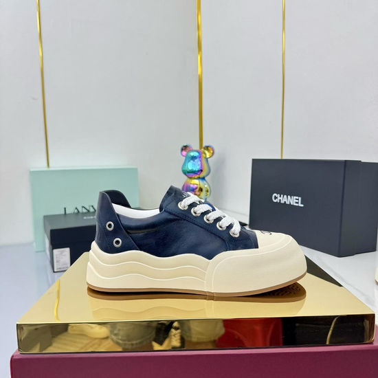 Chanel Classic Black and White Casual Board Shoes with Breathable Design