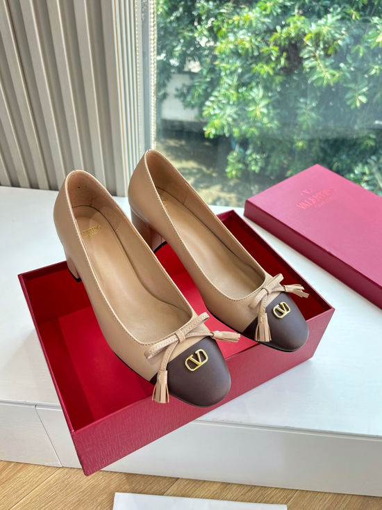 Valentino Elegant Slip-on Shoes with Smooth Lines and Height Boost