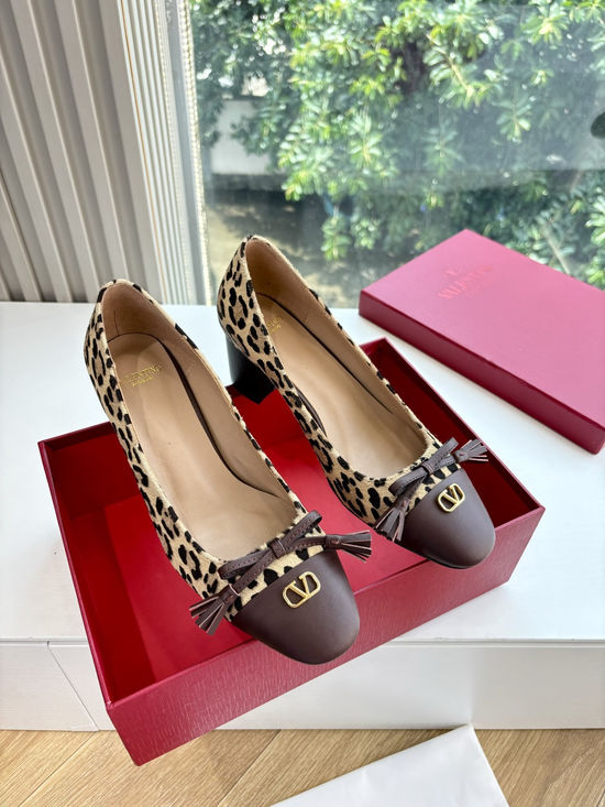 Valentino Elegant Slip-on Shoes with Smooth Lines and Height Boost