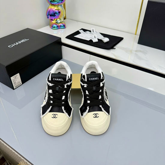 Chanel Classic Black and White Casual Board Shoes with Breathable Design