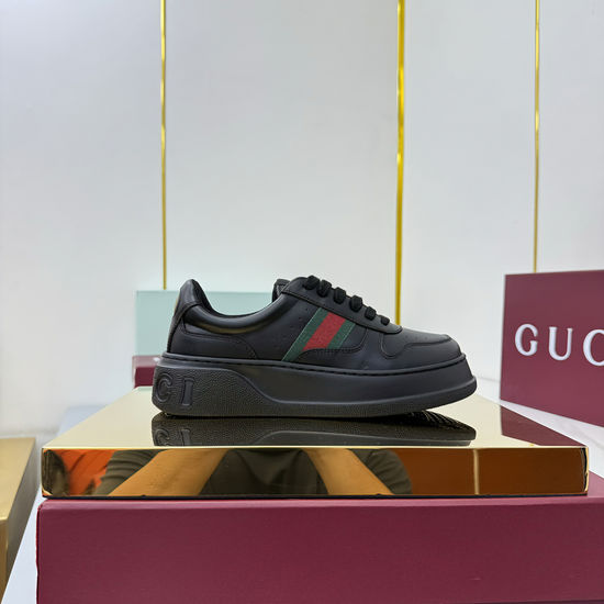 Gucci Embossed Leather Sneakers with Decorative Patches