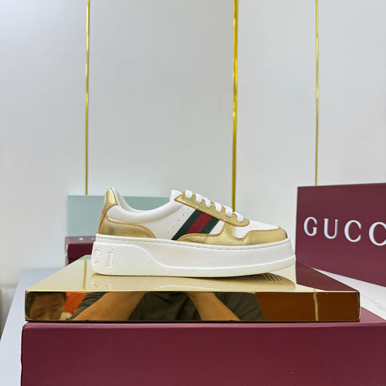 Gucci Embossed Leather Sneakers with Metal Accents