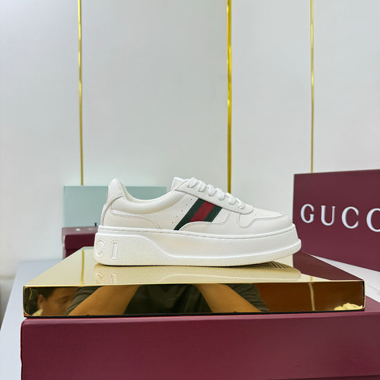 Gucci Embossed Leather Sneakers with Metal Accents