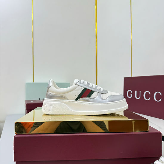 Gucci Embossed Leather Sneakers with Metal Accents