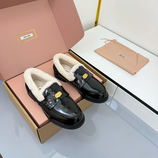 Miu Miu Vintage Distressed Leather Loafers for Casual Wear