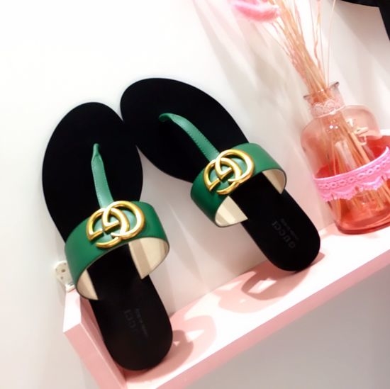 Gucci Cowhide Upper Flip Flops with Metal Decor