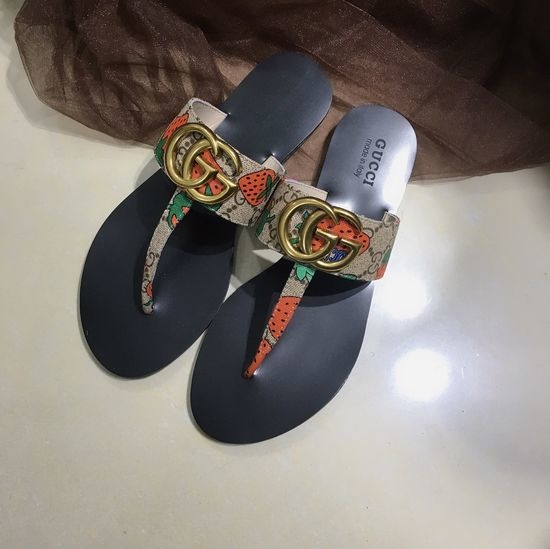 Gucci Cowhide Upper Flip Flops with Metal Decor