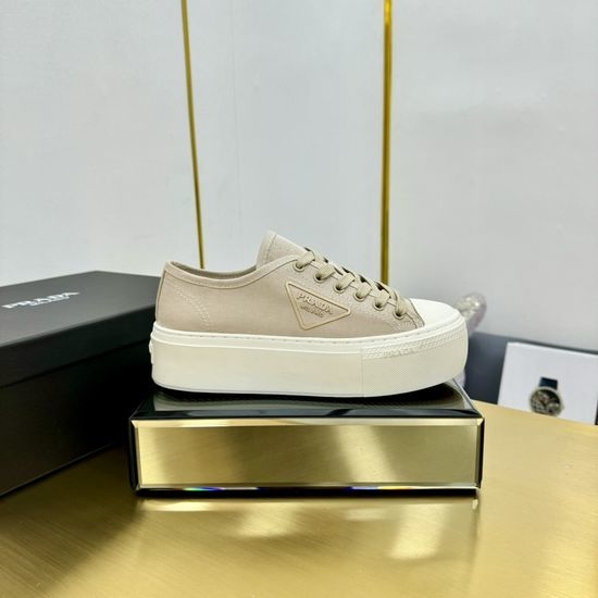 Prada Minimalist Casual Sneakers with Enamel Badge Detail