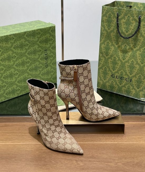 Gucci Pointed Toe Chain Ankle Boots With Monogram Upper