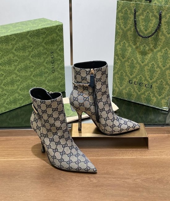 Gucci Pointed Toe Chain Ankle Boots With Monogram Upper
