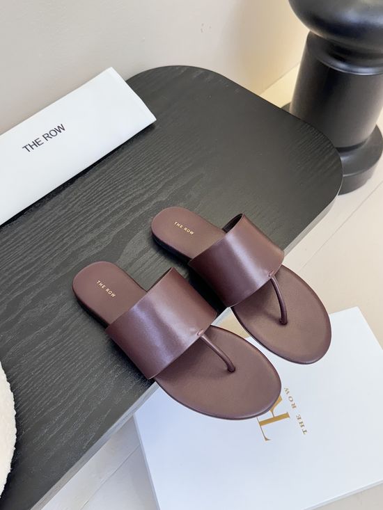 The Row Cowhide Thong Flat Slides With Sheepskin Lining