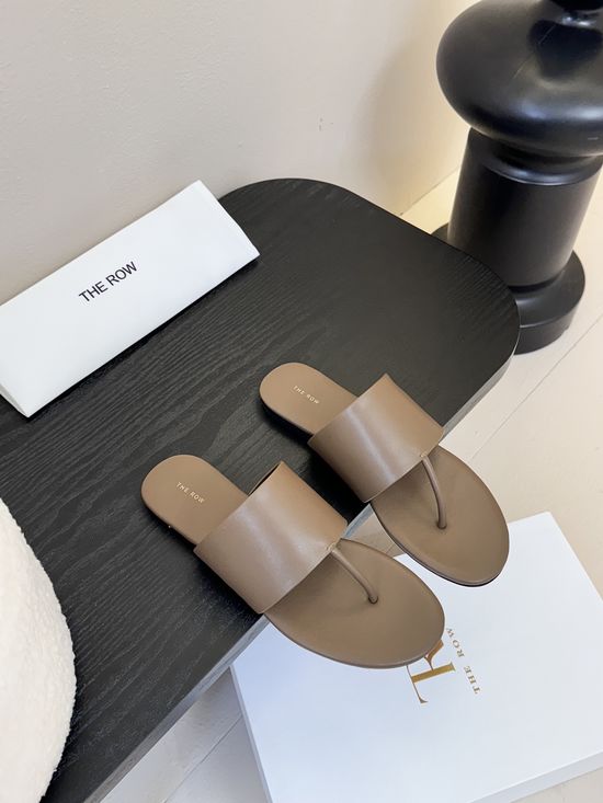 The Row Cowhide Thong Flat Slides With Sheepskin Lining