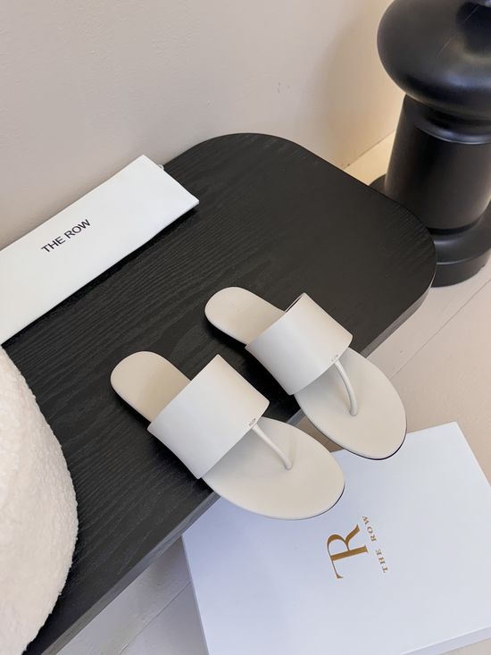 The Row Cowhide Thong Flat Slides With Sheepskin Lining