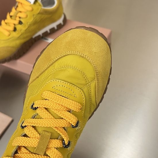 Miu Miu Comfortable Thick-Soled Canvas Sneakers with Retro Vibe