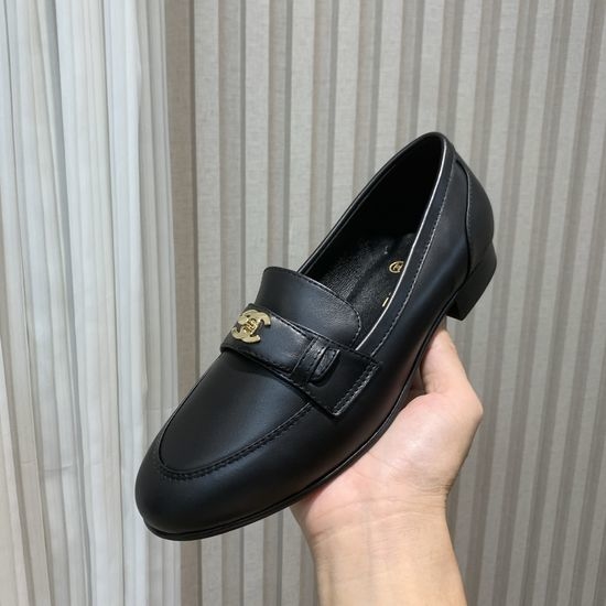 Chanel Elegant Leather Loafers With Logo Hardware Details