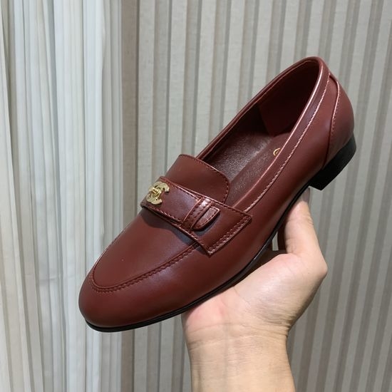 Chanel Elegant Leather Loafers With Logo Hardware Details