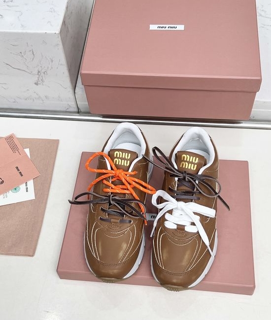 Miu Miu Vintage Distressed Chunky Sneakers with Dual Laces