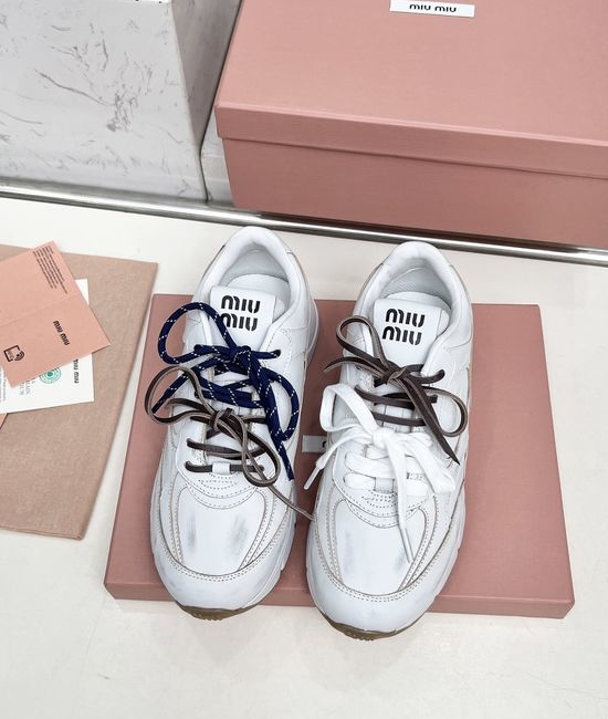 Miu Miu Vintage Distressed Chunky Sneakers with Dual Laces